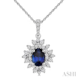 7x5 MM Oval Cut Sapphire and 1/2 Ctw Round Cut Diamond Halo Precious Pendant With Chain in 14K White Gold