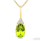 1/50 Ctw Oval Cut 6X4 MM Peridot and Round Cut Diamond Semi-Precious Pendant With Chain in 10K Yellow Gold