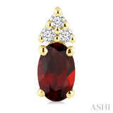 1/20 Ctw Oval Cut 5X3 MM Garnet and Round Cut Diamond semi-precious Earrings in 10K Yellow Gold