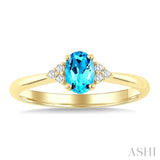 1/20 Ctw Oval Cut 6X4 MM Blue Topaz and Round Cut Diamond semi-precious Ring in 10K Yellow Gold