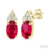 1/20 Ctw Oval Cut 5X3 MM Ruby and Round Cut Diamond Precious Earrings in 10K Yellow Gold