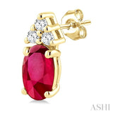1/20 Ctw Oval Cut 5X3 MM Ruby and Round Cut Diamond Precious Earrings in 10K Yellow Gold
