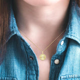 1/20 Ctw Round fluted medallion Round Cut Diamond Pirouette Pendant With Chain in 10K Yellow Gold