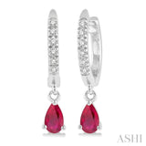 1/8 Ctw Round Cut Diamond & 5x3 MM Pear Cut Ruby Petite Fashion Huggie Earrings in 10K White Gold