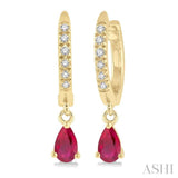 1/8 Ctw Round Cut Diamond & 5x3 MM Pear Cut Ruby Petite Fashion Huggie Earrings in 10K Yellow Gold