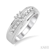 1/8 ctw Round Cut Diamond Engagement Ring in 14K White Gold